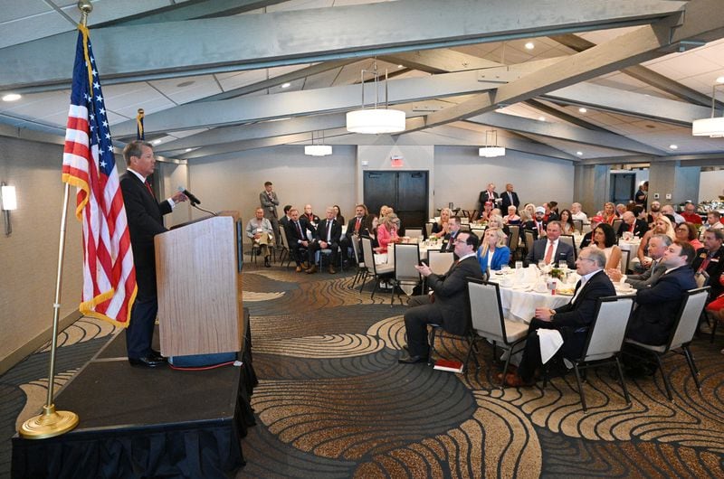 Gov. Brian Kemp speaks to the Georgia delegation attending the Republican National Convention at a breakfast gathering in Delavan, Wis.