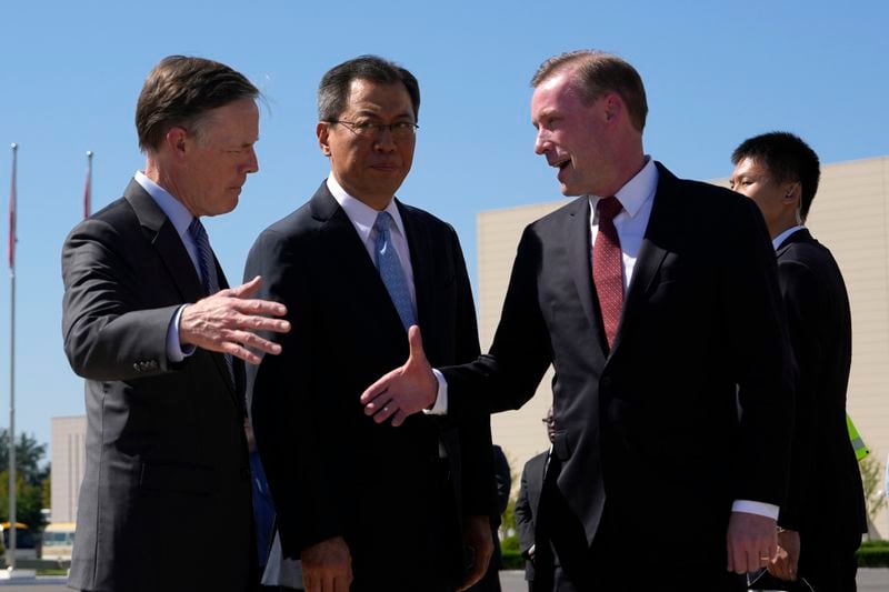 White House national security adviser Jake Sullivan, second right, is welcomed by Yang Tao, center left, Director General of the Department of North American and Oceanian Affairs of the Foreign Ministry, center and U.S. Ambassador to China Nicholas Burns at left upon arriving at the VIP terminal of the Beijing Capital International Airport in Beijing, Tuesday, Aug. 27, 2024. (AP Photo/Ng Han Guan Pool)