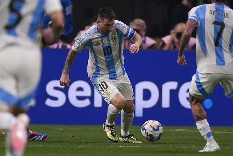 Argentina's Lionel Messi controls the ball during a Copa America Group A soccer match against Canada in Atlanta, Thursday, June 20, 2024. (AP Photo/Mike Stewart)