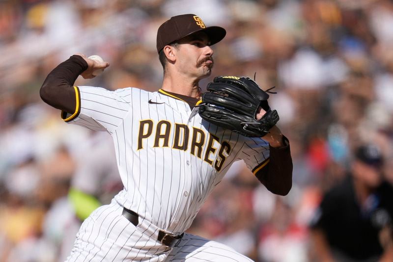 San Diego Padres starting pitcher Dylan Cease works against an Atlanta Braves batter during the second inning of a baseball game, Saturday, July 13, 2024, in San Diego. (AP Photo/Gregory Bull)