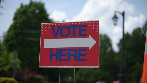 A voting sign outside of Cherokee County Elections Office on Monday, May 16, 2022. (Natrice Miller / natrice.miller@ajc.com)