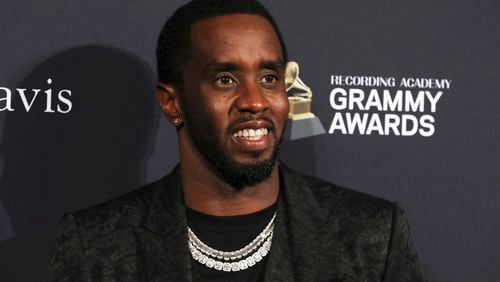 FILE - Sean Combs arrives at the Pre-Grammy Gala And Salute To Industry Icons at the Beverly Hilton Hotel on Saturday, Jan. 25, 2020, in Beverly Hills, Calif. A woman who says Combs subjected her to violence and abuse over several years in the 1990s has filed a lawsuit in New York, Thursday, May 23, 2024, accusing the rapper of sexual assault, battery and gender-motivated violence. (Photo by Mark Von Holden/Invision/AP, File)