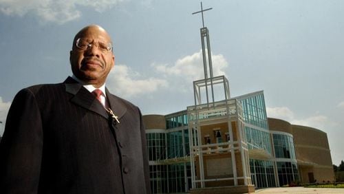 Rev. Jasper Williams Jr., pastor of Salem Bible Church East, is pictured standing in front of the newly built church located on Hillandale .