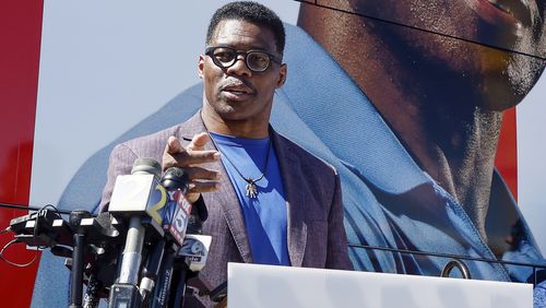 Republican U.S. Senate candidate Herschel Walker talks to the media at Battle Lumber Company in Wadley, Ga. on Thursday, October 6, 2022. (Natrice Miller/natrice.miller@ajc.com)  