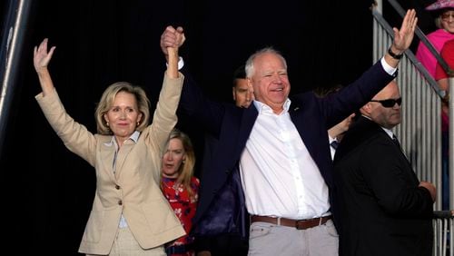 Democratic vice presidential nominee Minnesota Gov. Tim Walz is introduced with his wife Gwen during a campaign stop at Laborfest Monday, Sept. 2, 2024, in Milwaukee. (AP Photo/Morry Gash)