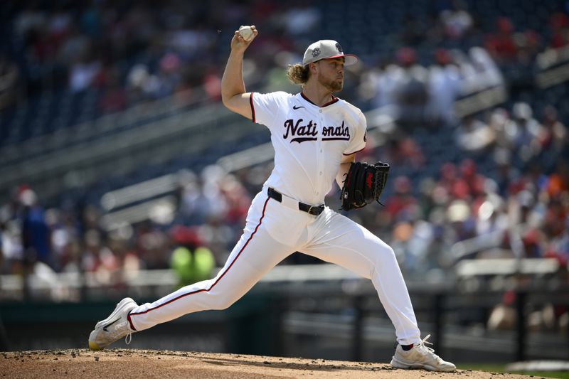 Washington Nationals starting pitcher Jake Irvin throws during the second inning of a baseball game against the New York Mets, Thursday, July 4, 2024, in Washington. (AP Photo/Nick Wass)