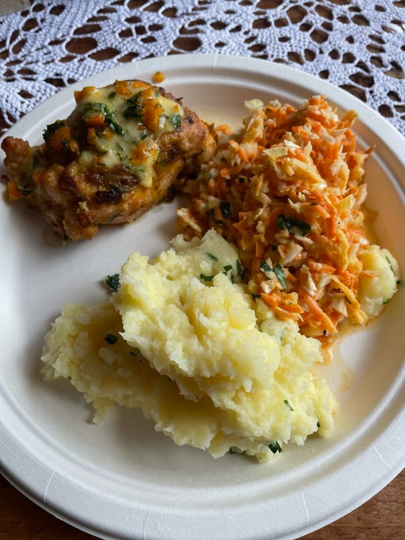 Baltic Deli's stuffed chicken with diced yellow pepper, dill and sheep's milk cheese is served with Polish slaw and mashed potatoes. (Sarra Sedghi for The Atlanta Journal-Constitution)