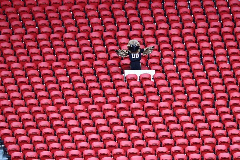 Falcons mascot Freddie Falcon has the stands all to himself in Mercedes-Benz Stadium against the Seattle Seahawks Sunday, Sept. 13, 2020, in Atlanta.  (Curtis Compton / Curtis.Compton@ajc.com)