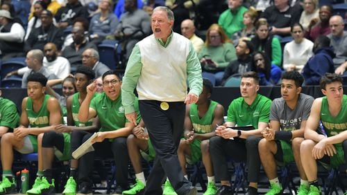 March 8, 2019 Macon - Buford head coach Eddie Martin shouts instructions at the end of the fourth quarter in GHSA State Basketball Championship game at the Macon Centreplex in Macon on Friday, March 8, 2019. Buford won 76-69 over the Fayette County. HYOSUB SHIN / HSHIN@AJC.COM