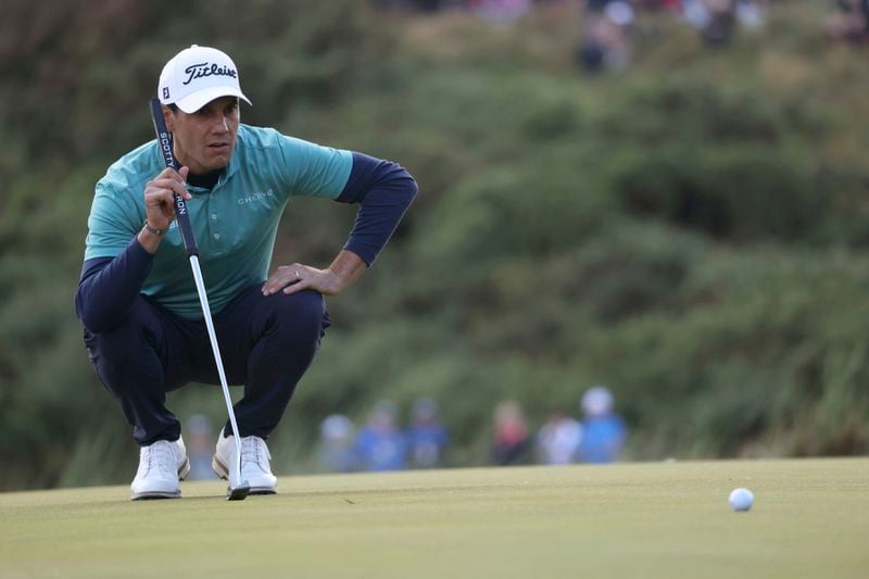 Italy's Matteo Manassero lines up a putt on the thirteenth green during day four of the Amgen Irish Open 2024 at Royal County Down in Newcastle, County Down, England, Sunday Sept. 15, 2024. (Peter Morrison/PA via AP)