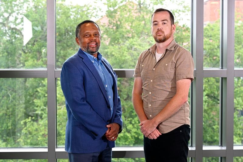 Earl Lewis, left, director of the Center for Social Solutions at the University of Michigan and Brad Bottoms, a data scientist at the center, stand together for a photo in Ann Arbor, Mich., Monday, July 22, 2024. (AP Photo/Jose Juarez)