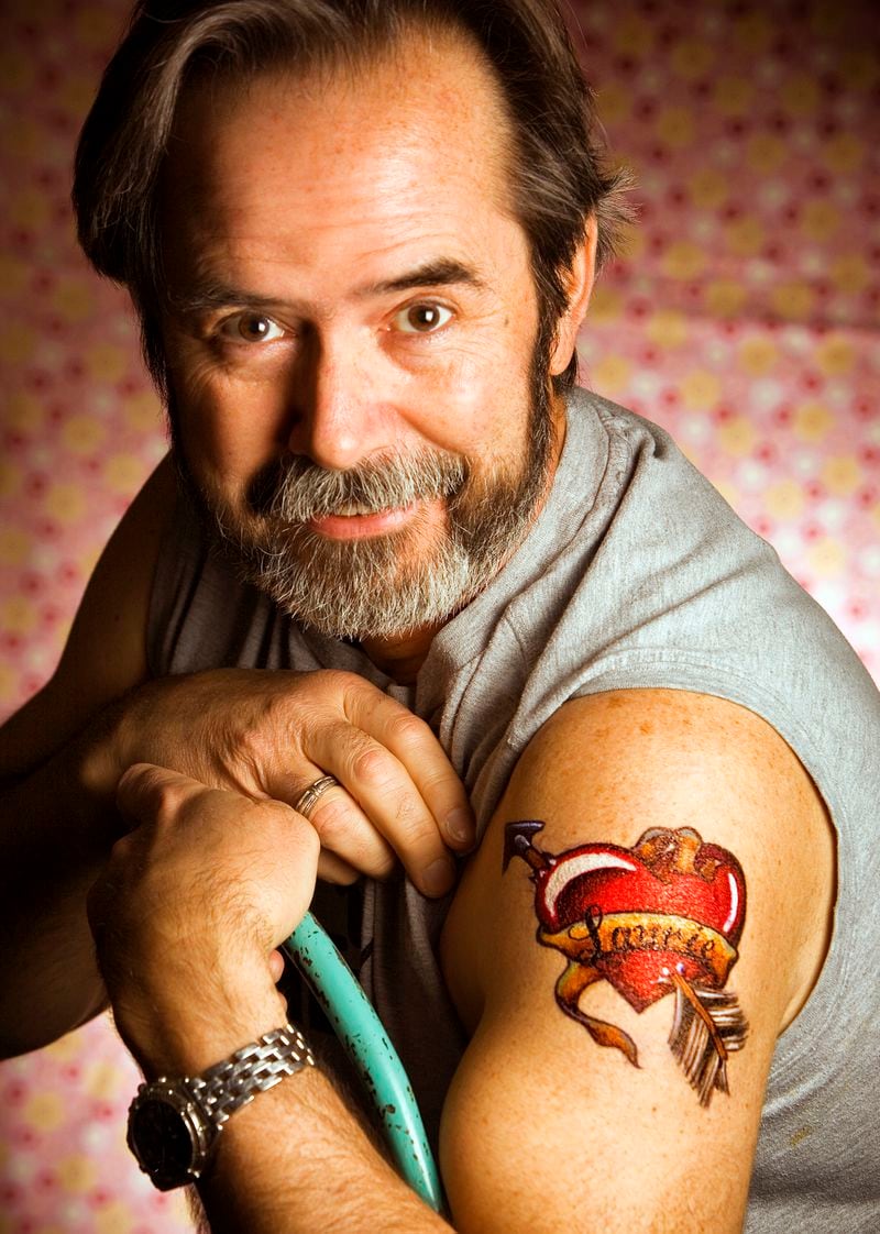 "One year for Valentine's Day, I got a tattoo artist to draw a tattoo of a heart with Laurie's name across it with felt tip markers," Billy Howard says. "While the tattoo eventually washed off, the sentiment has only gotten stronger." Courtesy of Billy Howard 