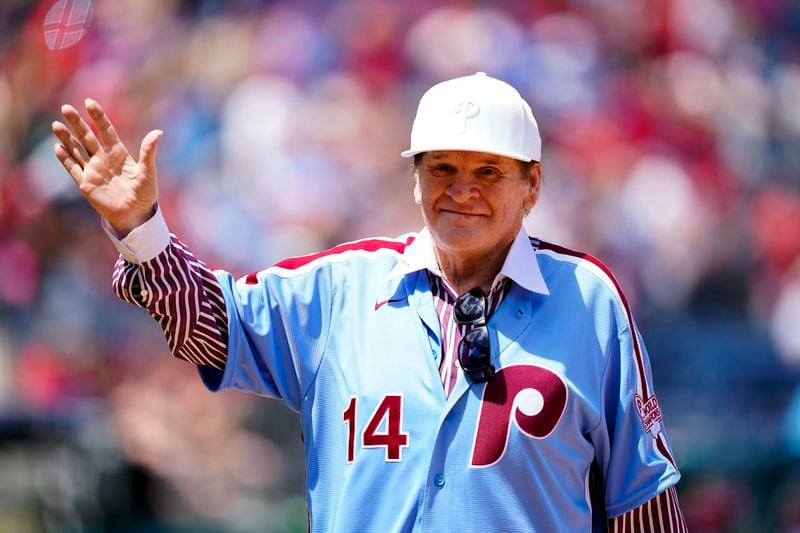 Former Philadelphia Phillies player Pete Rose waves to fans during an alumni day, Aug. 7, 2022, in Philadelphia. (AP Photo/Matt Rourke, File)