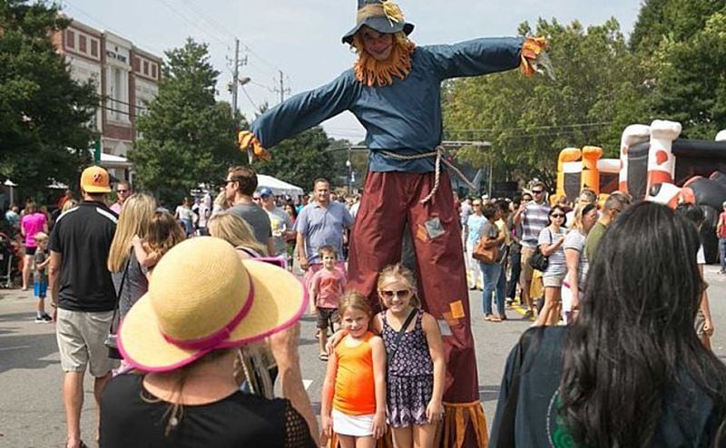 Over 100 scarecrows will line the streets of downtown Alpharetta at Saturday's Scarecrow Harvest.