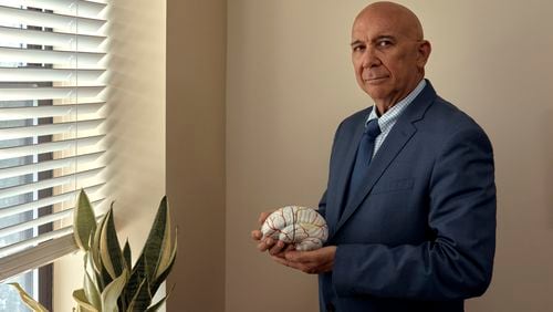 Dr. Fernando Taveras, a psychiatrist and Hispanic mental healthcare expert with SOMOS Community Care Clinic, stands for a portrait in New York on Wednesday, July 3, 2024. Mental health experts, community clinics and politicians are working to create new programs to break down barriers that Latinos might face to getting therapy or treatment. (AP Photo/Andres Kudacki)