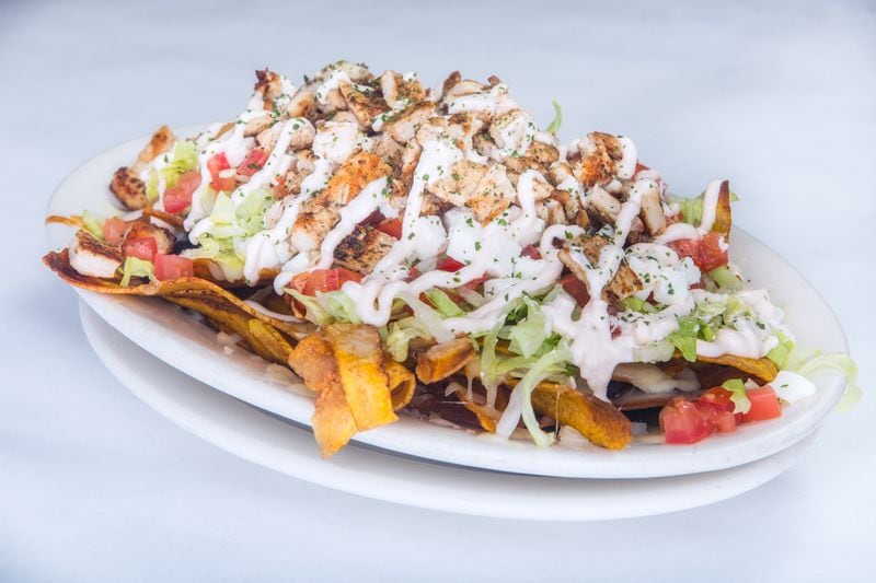 "Loaded Mariquitas" are a take on nachos, made with plantain chips instead of tortilla chips. / Mojito's Cuban-American Bistro