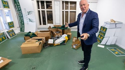  Bill White looks through some of the boxes that are left to move from the Buckhead City Committee Headquarters Thursday, Mar. 30, 2023.  (Steve Schaefer/steve.schaefer@ajc.com)