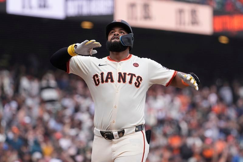 San Francisco Giants' Heliot Ramos celebrates after hitting a home run against the San Diego Padres during the ninth inning of a baseball game in San Francisco, Sunday, Sept. 15, 2024. (AP Photo/Jeff Chiu)