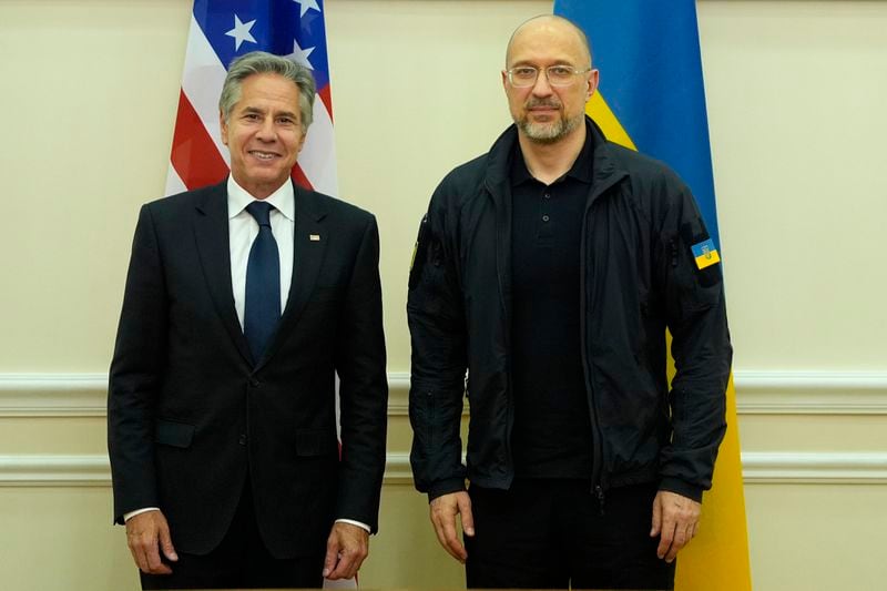 U.S. Secretary of State Antony Blinken poses for a photo with Ukraine's Prime Minister Denys Shmyhal at the Cabinet of Ministers in Kyiv, Ukraine, Wednesday, Sept. 11, 2024. (AP Photo/Mark Schiefelbein, Pool)