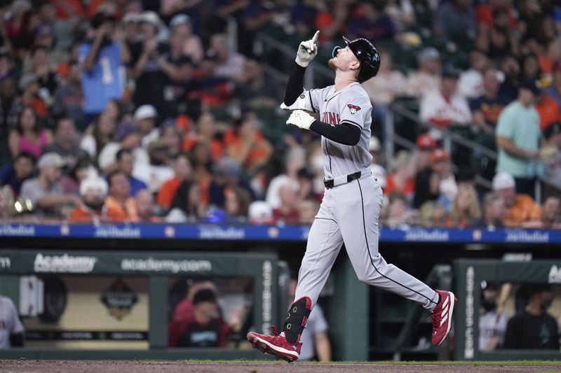 Arizona Diamondbacks' Pavin Smith celebrates after his grand slam against the Houston Astros during the third inning of a baseball game Sunday, Sept. 8, 2024, in Houston. (AP Photo/Eric Christian Smith)