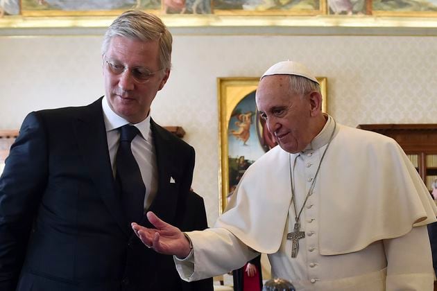 FILE -- Pope Francis, right, talks with Belgium's King Philippe during a private audience at the Vatican, Monday, March 9, 2015. (AP Photo/Gabriel Bouys, Pool, File)