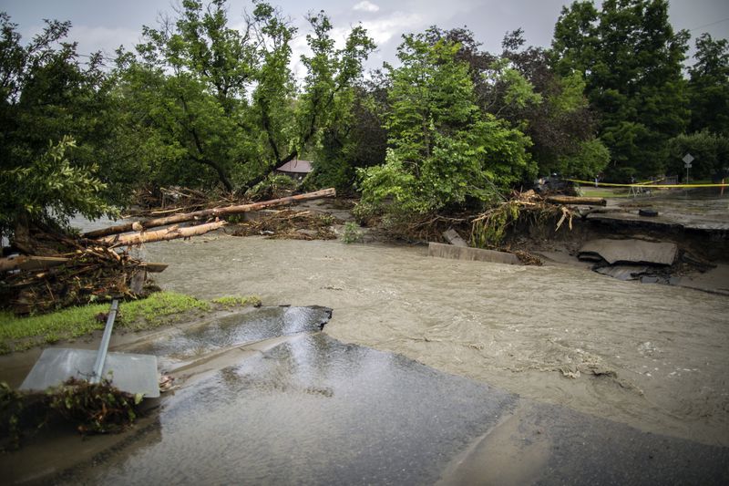 Debris and damaged along the Winooski River following flooding caused by the remnants of Hurricane Beryl, Thursday, July 11, 2024, in Plainfield, Vt. (AP Photo/Dmitry Belyakov)