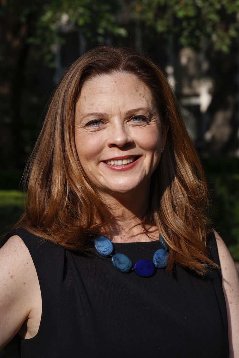 Tania Tetlow, president of Fordham University, poses fir a photo during Move In Day at the Bronx campus, Sunday Aug. 25, 2024, in New York. (AP Photo/Kena Betancur)