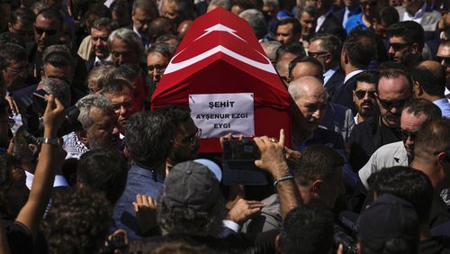 People attend the funeral prayers for Aysenur Ezgi Eygi, 26 year-old Turkish-American activist killed by the Israeli military, outside the central mosque of City of Didim, Turkey, Saturday, Sept. 14, 2024. (AP Photo/Khalil Hamra)