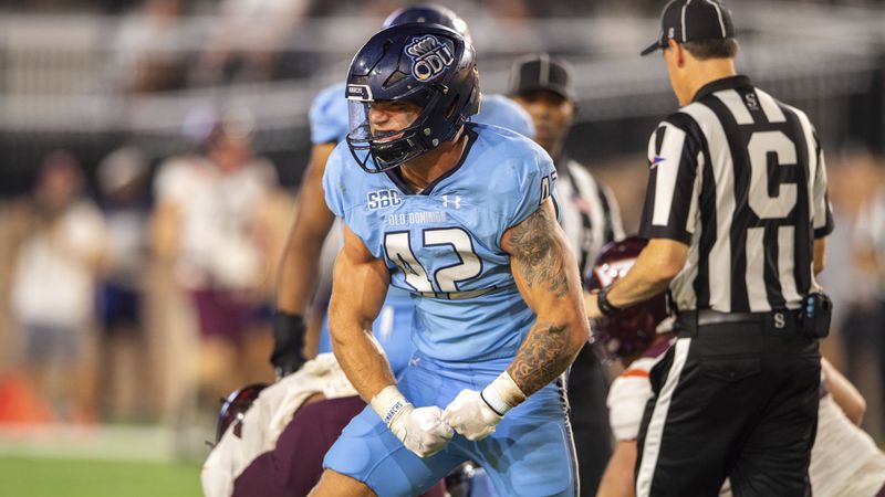 FILE - Old Dominion linebacker Jason Henderson celebrates after a tackle during an NCAA college football game, Sept. 2, 2022, in Norfolk, Va. (AP Photo/Mike Caudill, File)