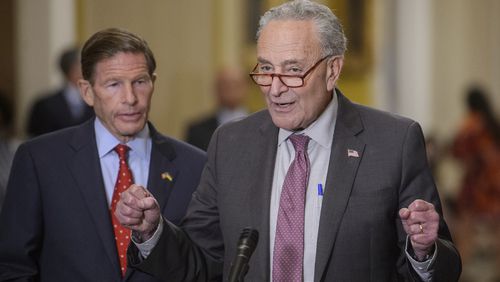 Sen. Richard Blumenthal, D-Conn., left, listens as Senate Majority Leader Chuck Schumer, D-N.Y., offers remarks following the Senate Democrats policy luncheon at the U.S. Capitol Tuesday, July 30, 2024, in Washington. (AP Photo/Rod Lamkey, Jr.)