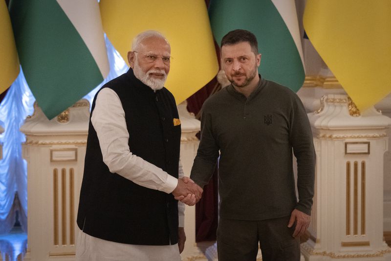 Indian Prime Minister Narendra Modi, left, meets with Ukrainian President Volodymyr Zelenskyy in Kyiv, Ukraine, on Friday, Aug. 23, 2024. (AP Photo/Efrem Lukatsky)