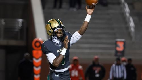 Langston Hughes quarterback Prentiss “Air” Noland attempts a pass during the first half against Rome in the Class 6A semi-final at Lakewood Stadium, Friday, December 2, 2022, in Atlanta. Jason Getz / Jason.Getz@ajc.com)
