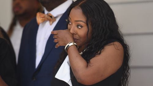Douglas County Probate Judge Christina Peterson wipes away tears during a news conference Friday in relation to her arrest at a Buckhead nightclub. (Photo by Ziyu Julian Zhu/AJC)