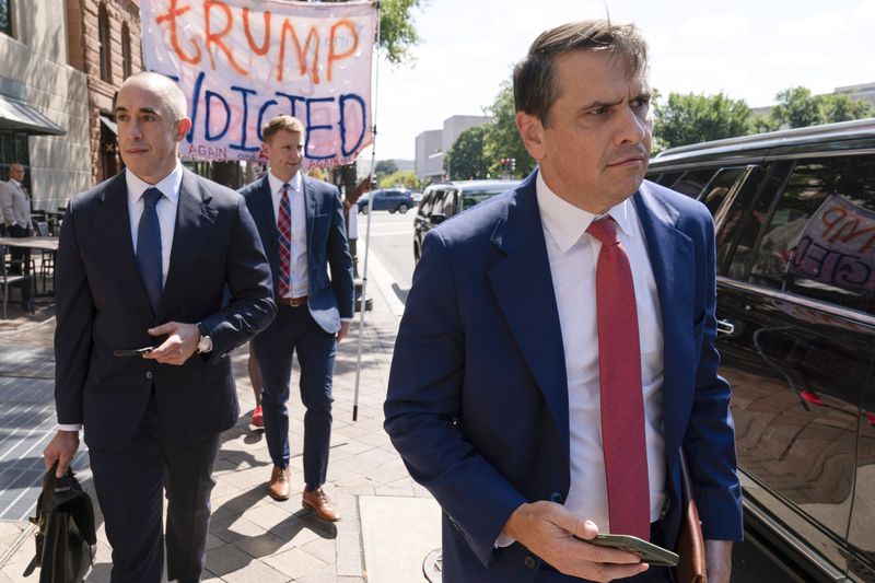 Former President Donald Trump attorneys Emil Bove, left, and Todd Blanche, right, leave the U.S. Federal Courthouse, after a hearing, Thursday, Sep. 5, 2024, in Washington. A judge is hearing arguments about potential next steps in the federal election subversion prosecution of Donald Trump in the first hearing since the Supreme Court narrowed the case by ruling that former presidents are entitled to broad immunity from criminal charges. (AP Photo/Jose Luis Magana)