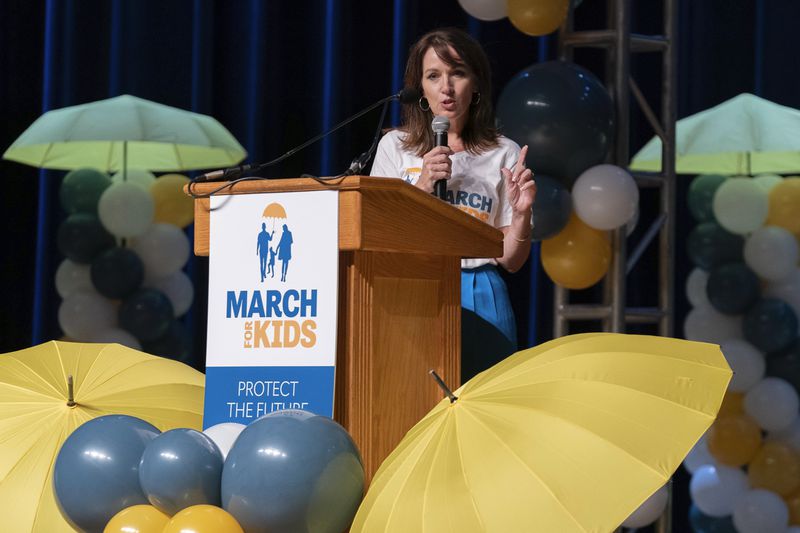 Moms for Liberty co-founder Tina Descovich speaks at the Moms for Liberty National Summit in Washington, Saturday, Aug. 31, 2024. (AP Photo/Jose Luis Magana)