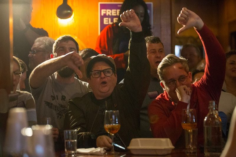 People boo as President Donald Trump speaks during his annual State of the Union address during a watch party for Fair Fight Founder and Chair Stacey Abrams at Noni's restaurant in Atlanta, Tuesday, February 5, 2019. (ALYSSA POINTER/ALYSSA.POINTER@AJC.COM)