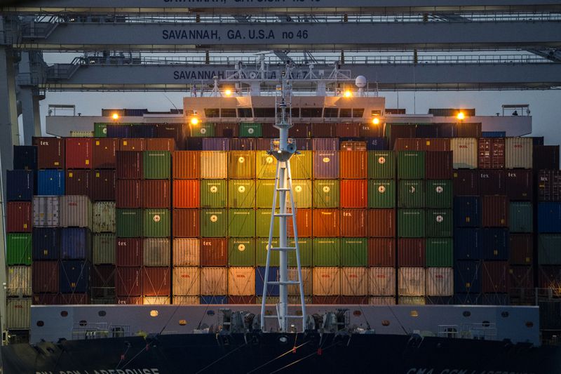 FILE - Ship to shore cranes work the container ship CMA CGM Laperouse at the Georgia Ports Authority's Port of Savannah, Sept. 29, 2021, in Savannah, Ga. (AP Photo/Stephen B. Morton, File)