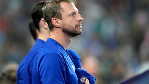 Texas Rangers pitcher Max Scherzer stands in the dugout during the seventh inning of a baseball game against the Miami Marlins, Sunday, June 2, 2024, in Miami. (AP Photo/Lynne Sladky)