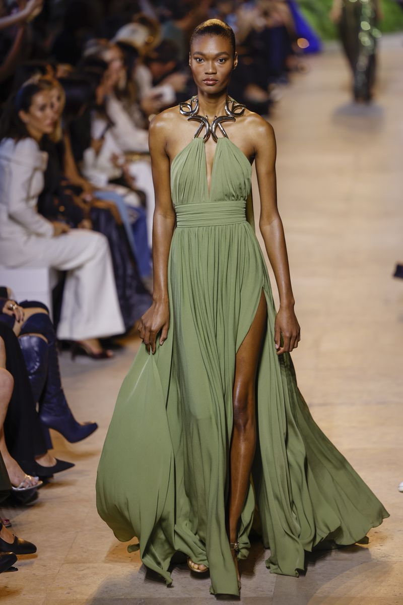 A model wears a creation as part of the Elie Saab Spring/Summer 2025 collection presented Saturday, Sept. 28, 2024, in Paris. (Photo by Vianney Le Caer/Invision/AP)