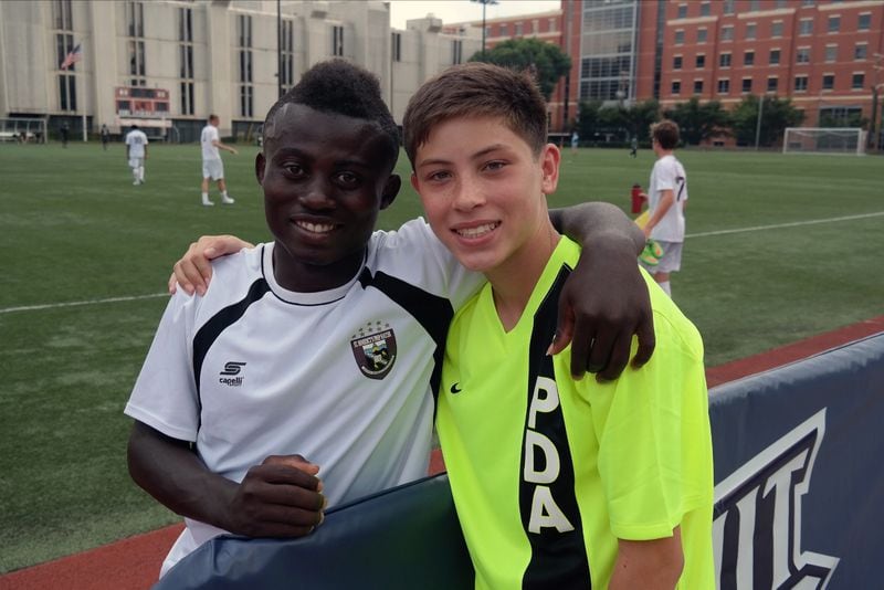 Anderson Asiedu and Matthew Leong pose at school. (Courtesy of the Leongs)