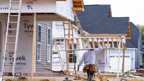 Overall sales of homes are down, but demand is still strong so the problem is largely because of a shortage in home resales. That has made new construction a bigger part of the metro Atlanta housing market. (Jim Watson/AFP via Getty Images/TNS)