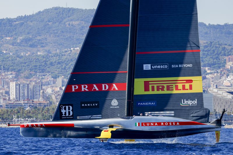 Luna Rosa Prada Pirelli Team's AC75 boat sails during a semi-final America's Cup Regatta ahead of the 37th America's Cup sailing race along the Barcelona's coast, Spain, Saturday, Sep. 14, 2024. (AP Photo/Joan Monfort)