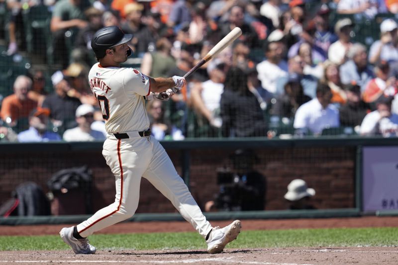 San Francisco Giants' Casey Schmitt watches his two-run home run against the Atlanta Braves during the sixth inning of a baseball game Thursday, Aug. 15, 2024, in San Francisco. (AP Photo/Godofredo A. Vásquez)