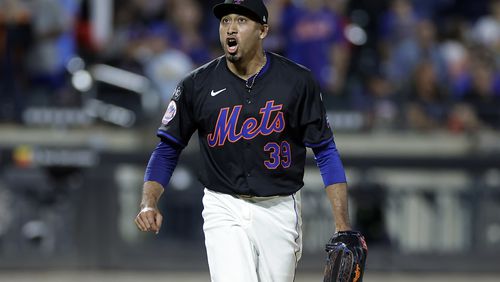 New York Mets pitcher Edwin Diaz reacts during the ninth inning of a baseball game against the Cincinnati Reds, Friday, Sept. 6, 2024, in New York. (AP Photo/Adam Hunger)