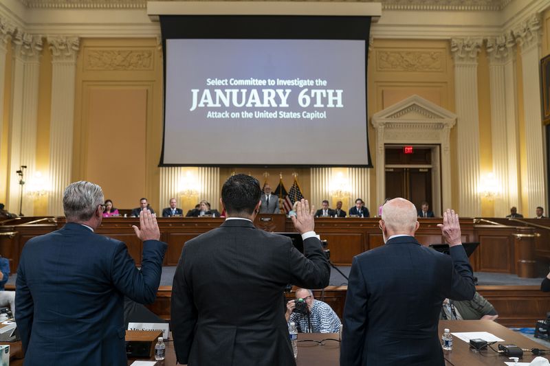 Witnesses Al Schmidt, former city commissioner of Philadelphia, BJay Pak, former U.S. attorney for the District of Georgia, and Benjamin Ginsburg, an election attorney, are sworn in on Monday, June 13, 2022, to testify before a House Select Committee investigating the Jan. 6 attack on the U.S. Capitol, in Washington, D.C. (Kent Nishimura/Los Angeles Times/TNS)