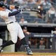 New York Yankees' Aaron Judge hits a two-run double against the Minnesota Twins during the third inning of a baseball game Tuesday, June 4, 2024, in New York. (AP Photo/Frank Franklin II)