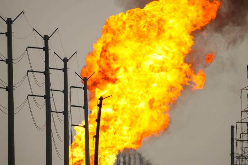 A pipeline carrying liquified natural gas burns near Spencer Highway and Summerton on Monday, Sept. 16, 2024, in La Porte, Texas. (Brett Coomer/Houston Chronicle via AP)