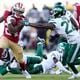 Former Georgia Tech running back Jordan Mason (left) started in place of an injured Christian McCaffrey for the 49ers in their 32-19 victory over the Jets in a Monday Night Football matchup. (AP photo/Godofredo A. Vásquez)