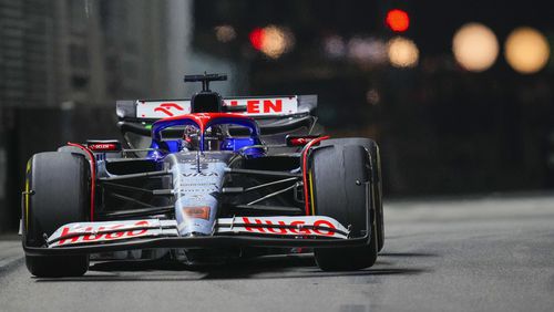 RB driver Daniel Ricciardo of Australia steers his car during the Singapore Formula One Grand Prix at the Marina Bay Street Circuit, in Singapore, Sunday, Sept. 22, 2024. (AP Photo/Vincent Thian)