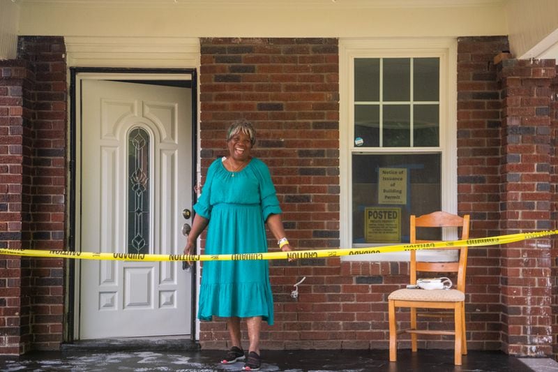 Dorothy Williams, who fell victim to a home repair scam, poses for a picture in her home in Atlanta on Thursday, July 18, 2024.  (Ziyu Julian Zhu / AJC)